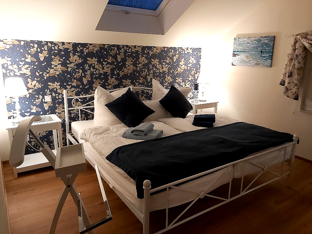First bedroom with double bed in the Wasserturm apartment